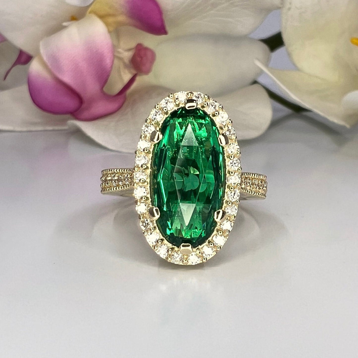 Elongated oval rose cut green emerald, diamond halo, engagement ring, 5.50ctw, 14k yellow gold