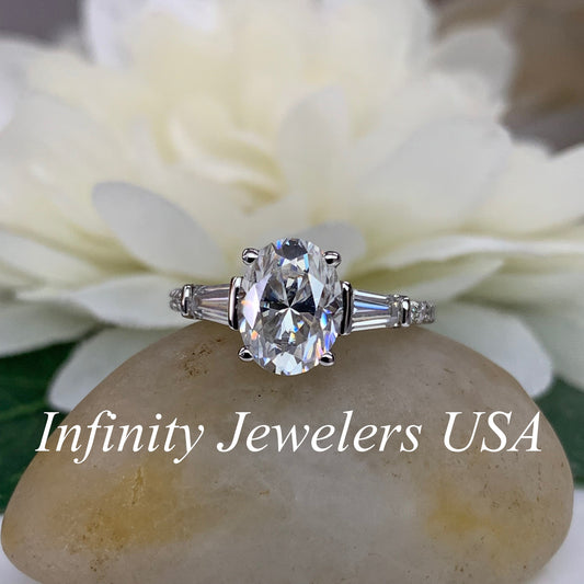 Oval moissanite and diamond engagement ring with baguettes and round accents, 14k white gold #5074