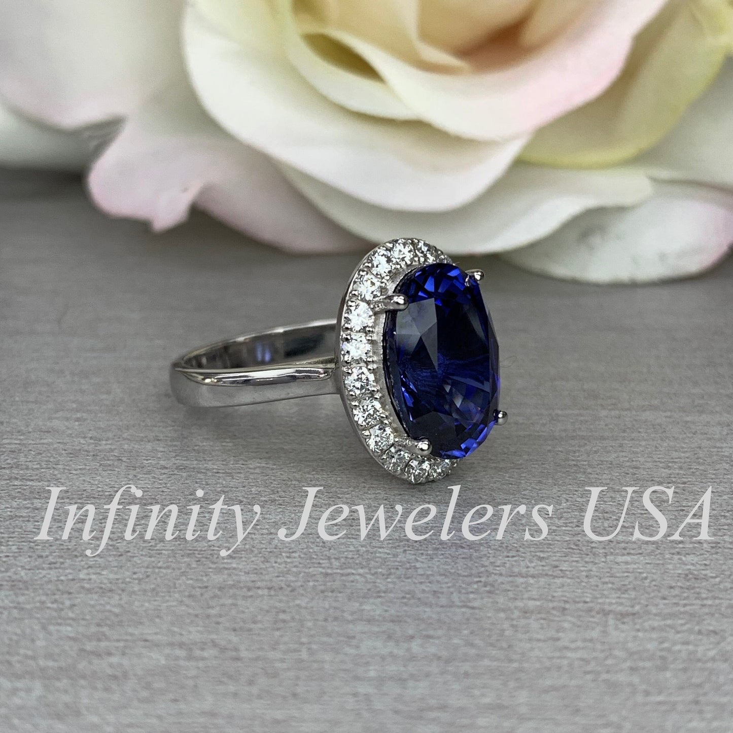 Elongated Oval Sapphire And Diamond Halo Style Engagement Wedding Anniversary Ladies Ring 14K White Gold #5656