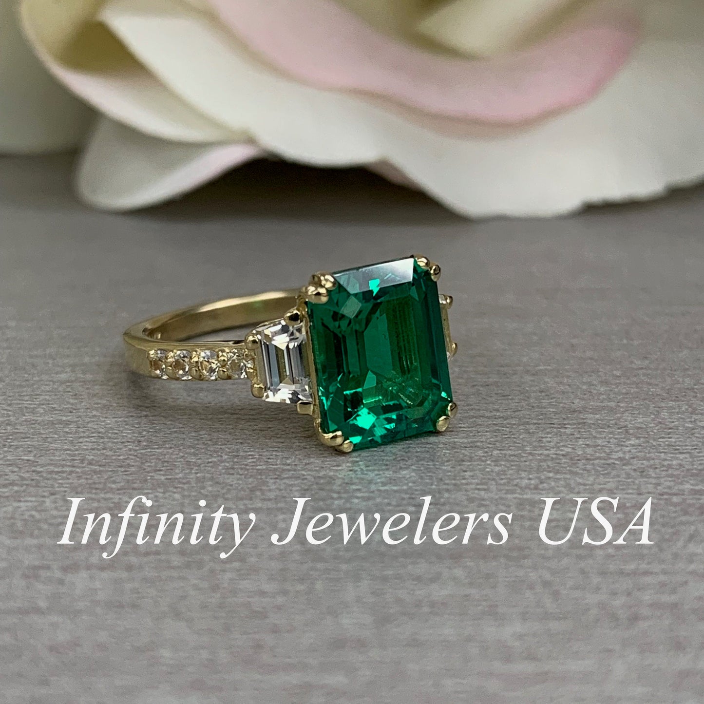 Emerald cut green emerald with trapezoid sides and round accents engagement ring, 4.50ctw, 14k yellow gold #6103
