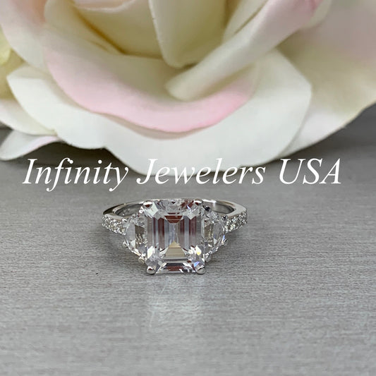 Moissanite emerald cut engagement ring, ring with half moon and round accents,  4.50CTW14k white gold