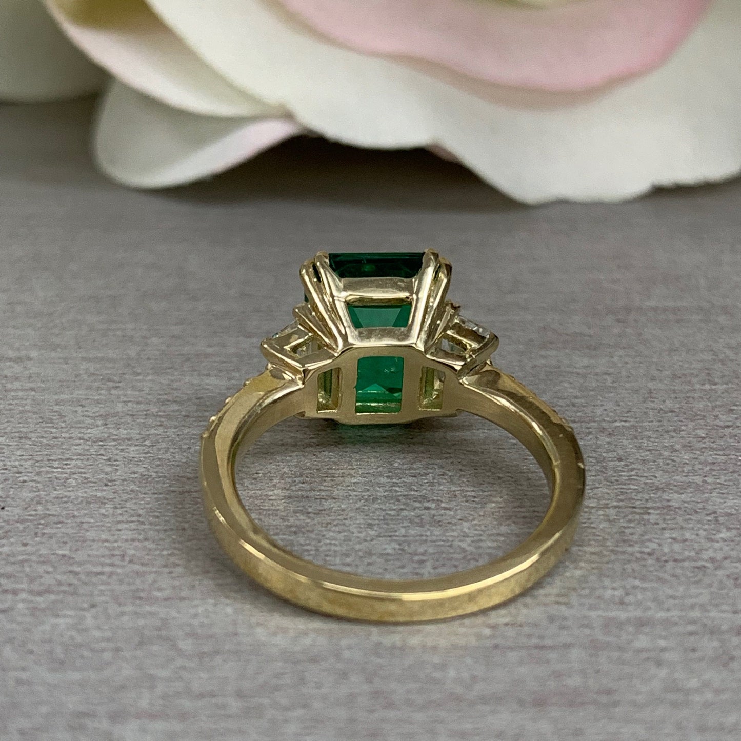 Emerald cut green emerald with trapezoid sides and round accents engagement ring, 4.50ctw, 14k yellow gold #6103