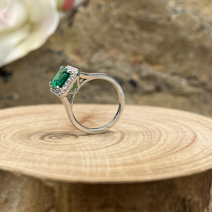 Emerald cut emerald engagement ring with diamond halo set in 14k white gold #5457