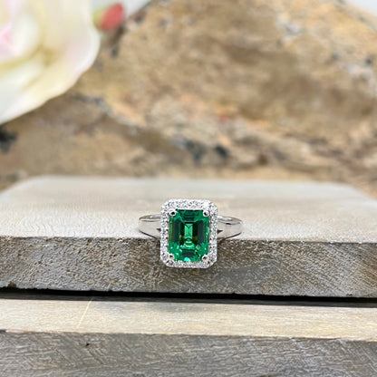 Emerald cut emerald engagement ring with diamond halo set in 14k white gold #5457