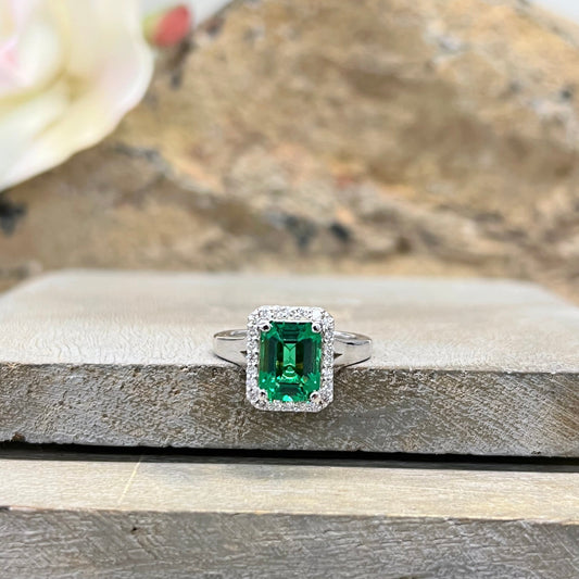Emerald cut emerald engagement ring with diamond halo set in 14k white gold #5457