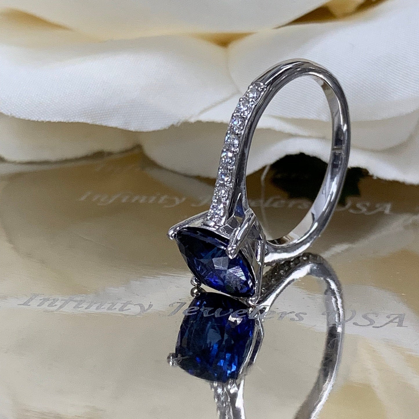 Blue sapphire cushion cut engagement ring, with round diamond accents, 2.65ctw, 14k white gold wedding ring
