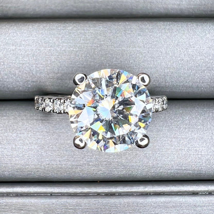 Moissanite Round Brilliant Solitaire Engagement Ring With Round Moissanite Accents In 14K White Gold, Infinity Jewelers USA #6903 #6904