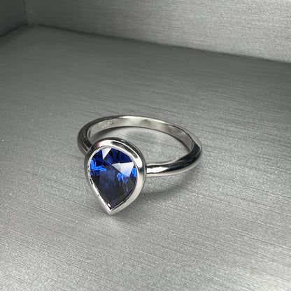 Pear shape  blue sapphire ladies ring, bezel set in 14k white gold #5860