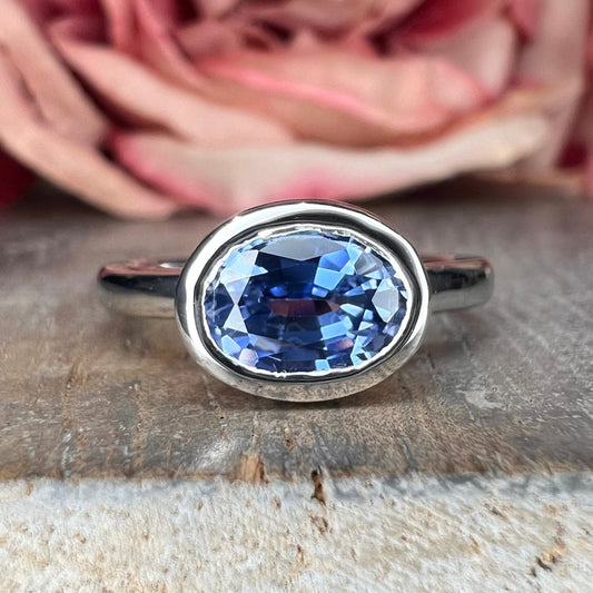 Oval cut blue sapphire bezel set ring 14K white gold, east west oval sapphire stacking ring Unique bezel set blue sapphire ladies ring #7790
