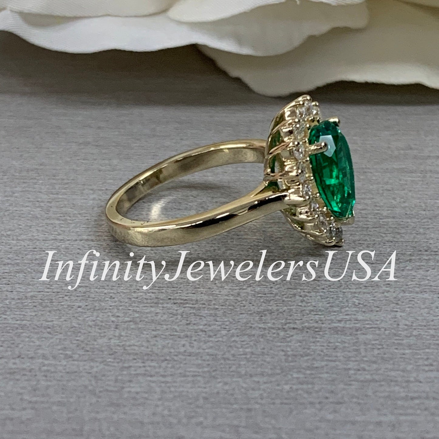 Pear Shape Green Emerald Engagement Ring With Round Moissanite Accents Made With Solid 14K Yellow Gold Item #6818