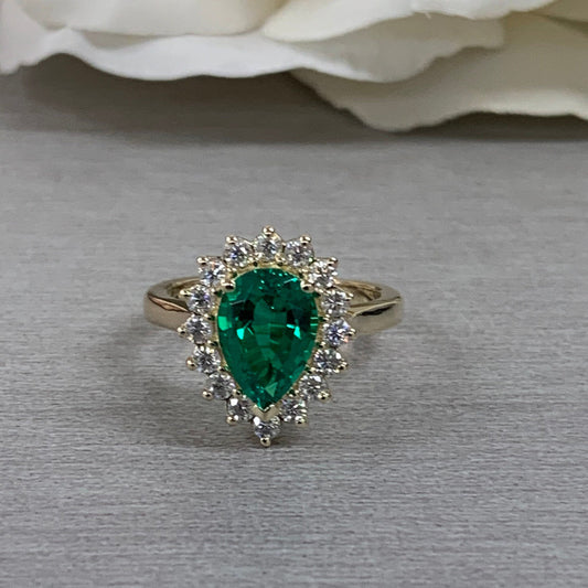 Pear Shape Green Emerald Engagement Ring With Round Moissanite Accents Made With Solid 14K Yellow Gold Item #6818