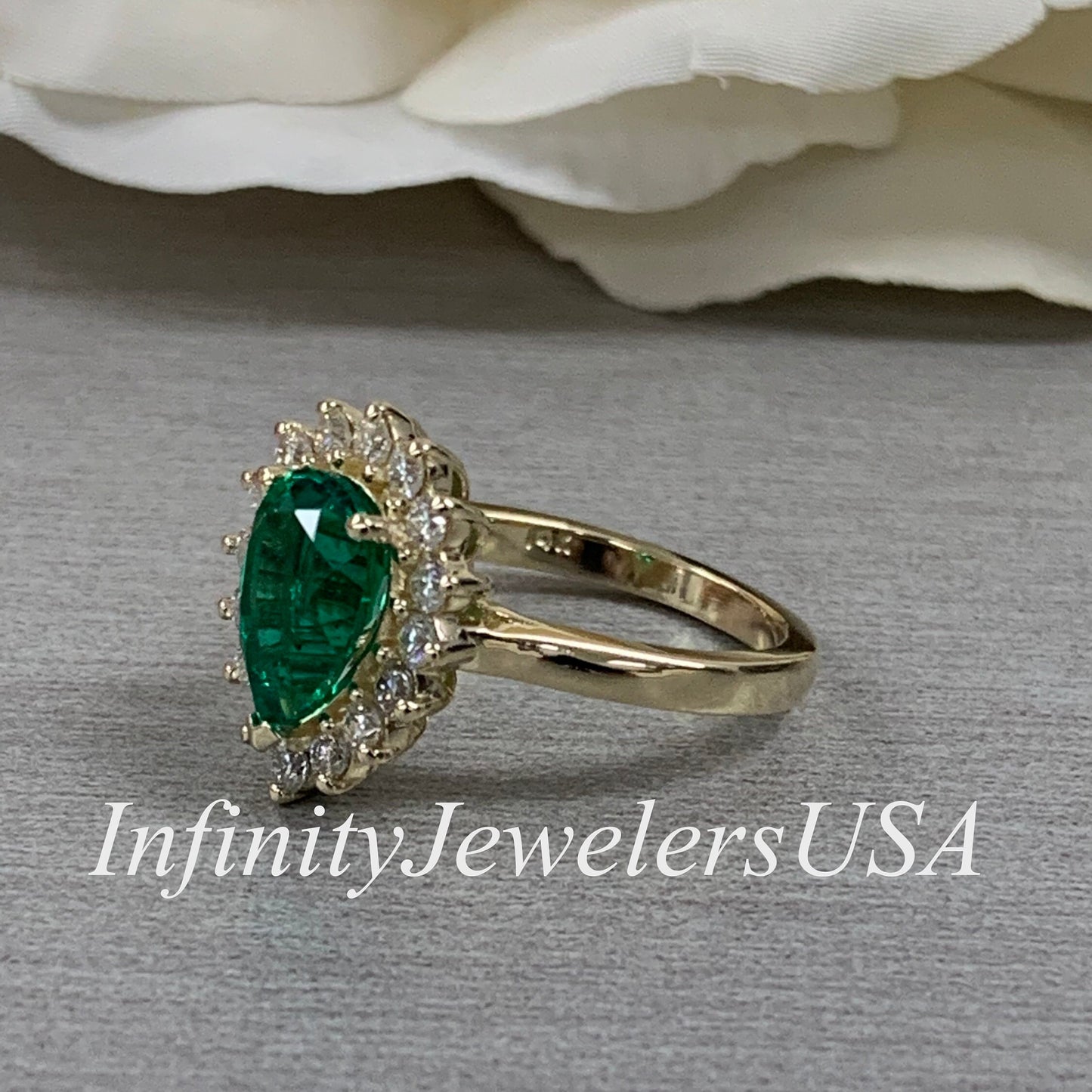 Pear Shape Green Emerald Engagement Ring With Round Moissanite Accents Made With Solid 14K Yellow Gold Item #6818