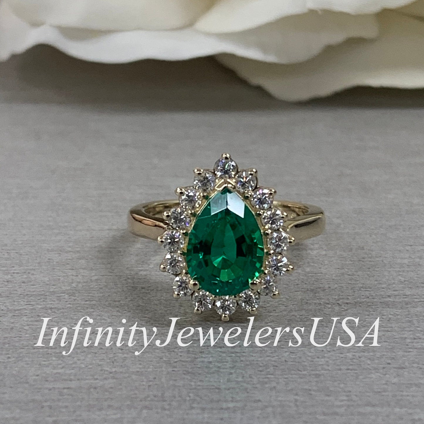 Pear Shape Green Emerald Engagement Ring With Round Moissanite Accents Made With Solid 14K Yellow Gold Item #6818
