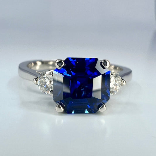 Blue sapphire asscher cut engagement ring, with round Moissanite 14k white gold