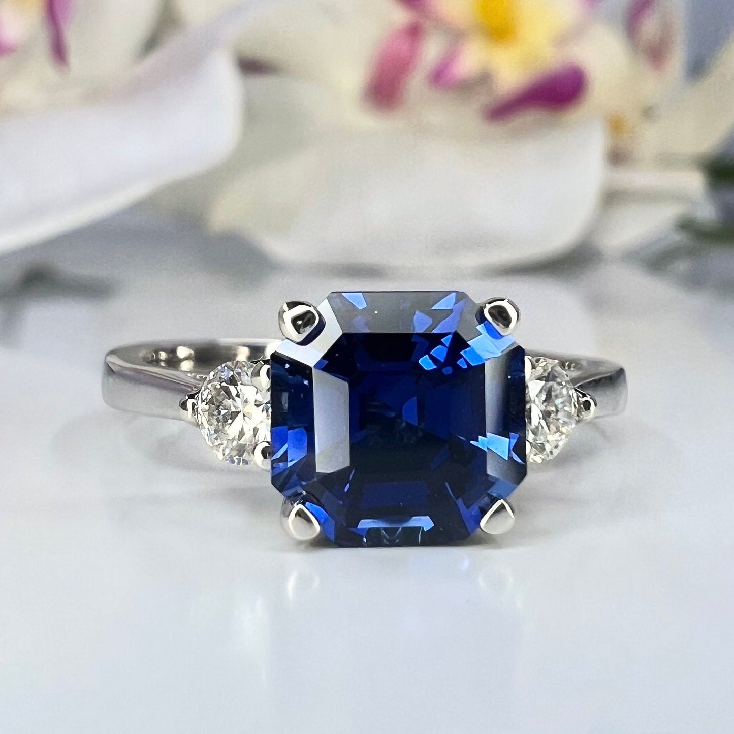 Blue sapphire asscher cut engagement ring, with round Moissanite 14k white gold