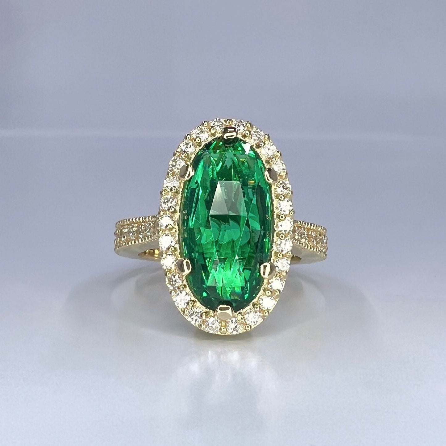 Elongated oval rose cut green emerald, diamond halo, engagement ring, 5.50ctw, 14k yellow gold