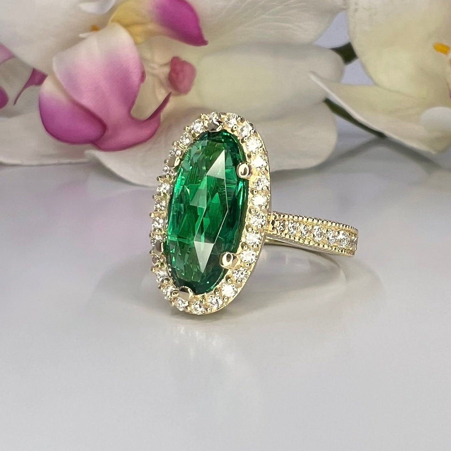 Elongated oval rose cut green emerald, diamond halo, engagement ring, 5.50ctw, 14k yellow gold