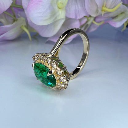 Emerald Engagement Ring With Champagne Color Diamonds Set In A Halo Design In 14K Yellow Gold 6604
