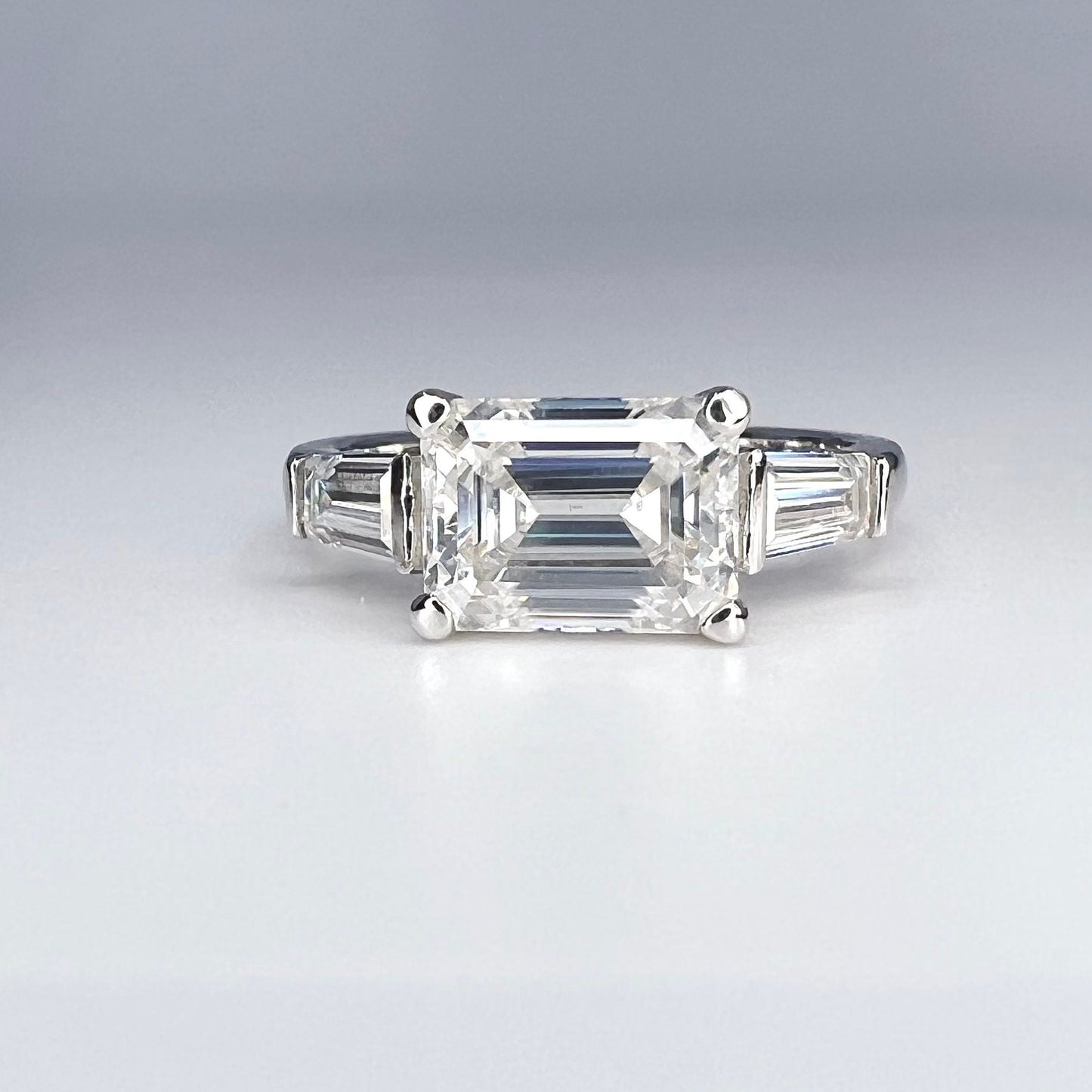 East to West Emerald Cut Moissanite Engagement Ring With Tapered Baguette Diamond Side Stones in 14K Solid White Gold, or Yellow Gold #8114